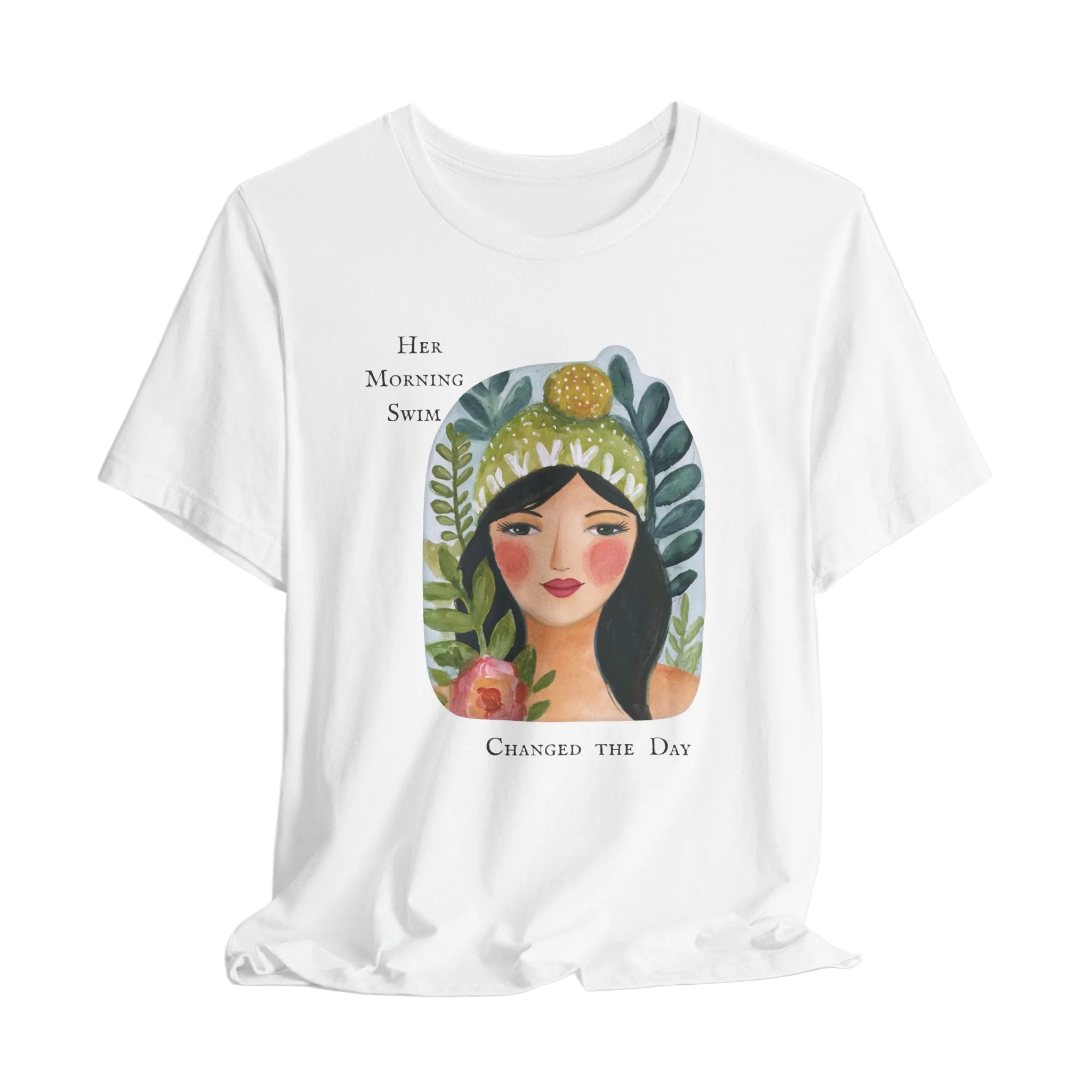 White t-shirt with a graphic of a woman's face surrounded by plants and text on a white background