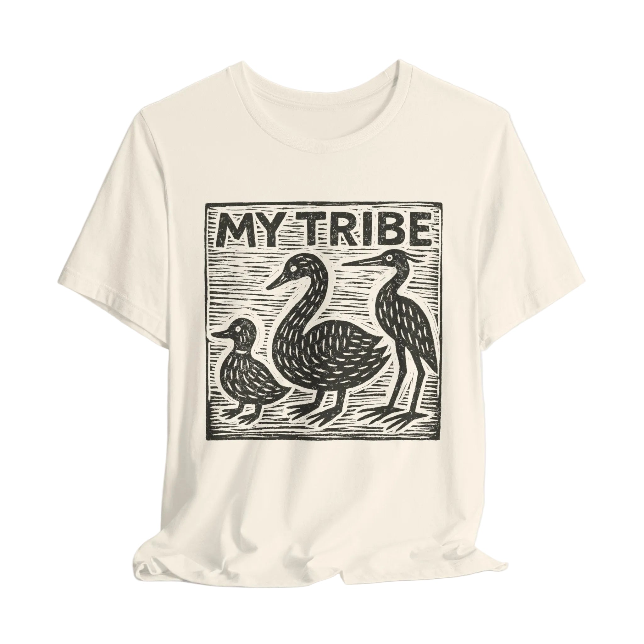 Beige t-shirt with black graphic of birds and 'MY TRIBE' text on a light gray background